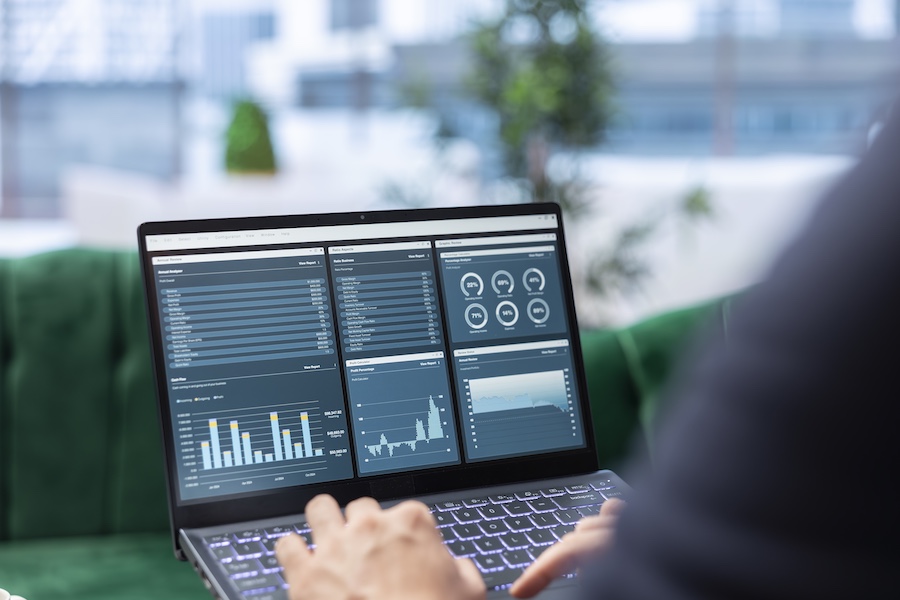 Determined CEO works in office analyzing infographics and setting business goals